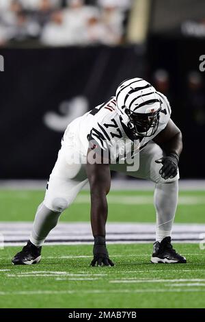 Cincinnati Bengals guard Hakeem Adeniji (77) warms up during an NFL  preseason football game against the New York Giants, Sunday, Aug. 21, 2022  in East Rutherford, N.J. The Giants won 25-22. (AP