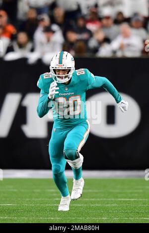 Miami Dolphins tight end Tanner Conner (80) covers a kick during an NFL  football game against the Buffalo Bills, Sunday, Sept. 25, 2022 in Miami  Gardens, Fla. The Dolphins defeat the Bills