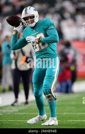 Miami Dolphins tight end Tanner Conner (80) covers a kick during an NFL  football game against the Buffalo Bills, Sunday, Sept. 25, 2022 in Miami  Gardens, Fla. The Dolphins defeat the Bills