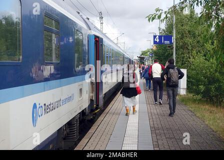 16.07.2022, Germany, Schleswig-Holstein, Buechen - Passengers got off a Ceske drahy train at Buechen station. 00S220716D555CAROEX.JPG [MODEL RELEASE: Stock Photo