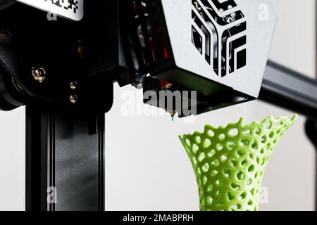 3d printer with a vase printed with pla filament Stock Photo