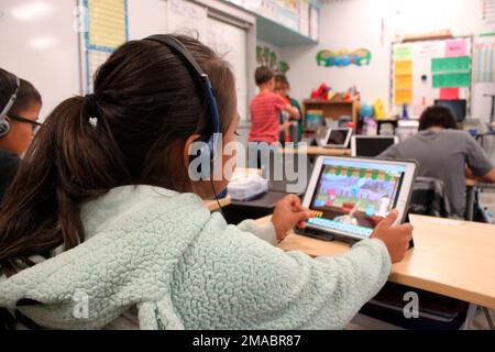 https://l450v.alamy.com/450v/2mabr87/corrects-images-rpsb104-107-city-is-kirtland-instead-of-kirkland-this-sept-21-2022-image-shows-a-second-grade-student-working-on-a-math-lesson-at-judy-nelson-elementary-school-in-kirtland-new-mexico-the-closure-of-the-nearby-san-juan-generation-station-and-the-adjacent-mine-is-resulting-in-the-loss-of-hundreds-of-jobs-and-tax-revenue-for-the-central-consolidated-school-district-which-serves-primarily-native-american-students-ap-photosusan-montoya-bryan-2mabr87.jpg