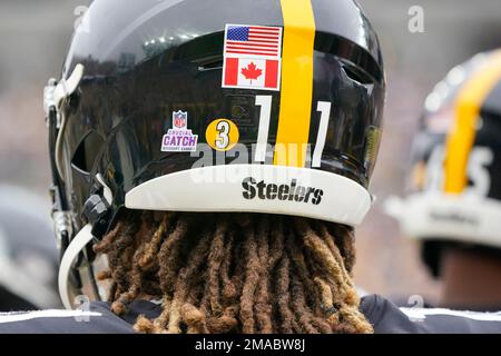 Pittsburgh Steelers wide receiver Chase Claypool (11) wears a Crucial Catch  sticker and a Canadian flag sticker on his helmet during the first half of  an NFL football game against the New