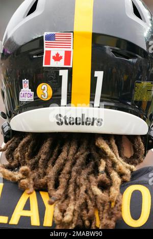 A salute to service sticker is on the back of the helmet of Pittsburgh  Steelers wide receiver Chase Claypool (11) before an NFL football game  against the Chicago Bears, Monday, Nov. 8