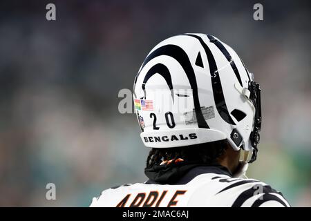 Flag decals are seen on the helmet of Cincinnati Bengals defensive back Eli  Apple (20) during pregame warmups before an NFL football game against the  Miami Dolphins on Thursday, September 29, 2022, in Cincinnati. (AP  Photo/Matt Patterson Stock