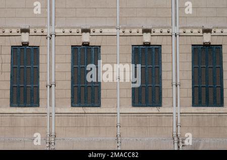 Shuttered windows on a building Stock Photo