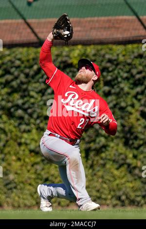 Chicago Cubs' Franmil Reyes laughs as he runs the bases after hitting a  two-run home run during the eighth inning of the team's baseball game  against the Cincinnati Reds in Cincinnati, Wednesday