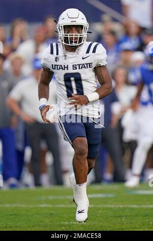 Utah State wide receiver Terrell Vaughn (0) turns to catch the ball on ...