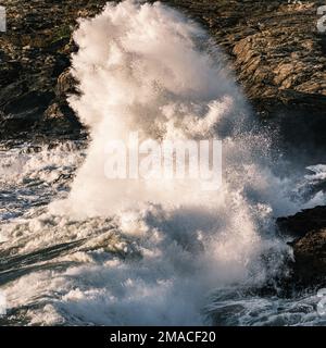Waves crashing against the rocks Stock Photo