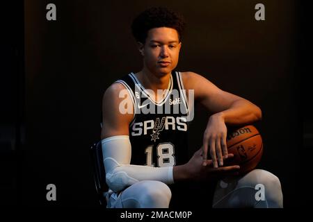 San Antonio Spurs forward Isaiah Roby (18) poses for photos during