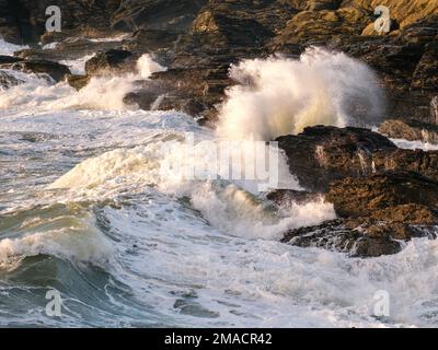 Waves crashing against the rocks Stock Photo