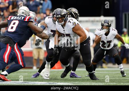 Baltimore Ravens offensive tackle Daniel Faalele (77) works out during the  team's NFL football training camp, Saturday, July 29, 2023, in Baltimore.  (AP Photo/Nick Wass Stock Photo - Alamy