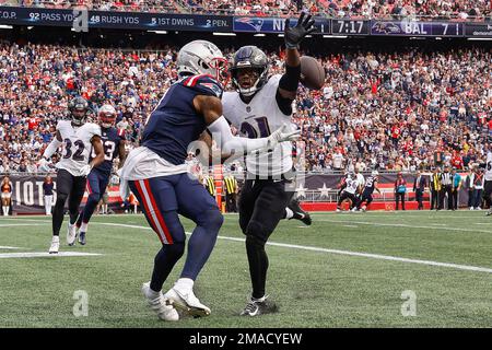 New England Patriots' DeVante Parker, right, against Baltimore Ravens'  Jalyn Armour-Davis, center, and Chuck Clark, left, during an NFL football  game, Sunday, Sept. 25, 2022, in Foxborough, Mass. (AP Photo/Paul  Connors).(AP Photo/Paul