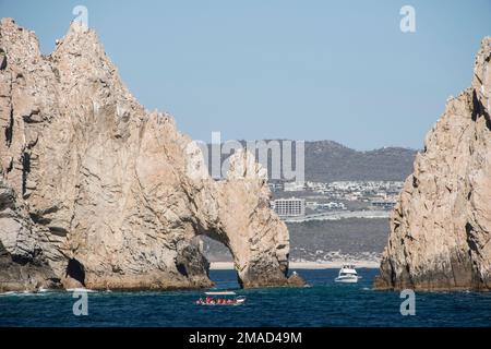 The Cabo Arch is perhaps the most famous landmark in Cabo San Lucas, Mexican Riviera, Mexico. It is only reachable via boat and sits at Land's End. Stock Photo