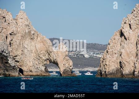 The Cabo Arch is perhaps the most famous landmark in Cabo San Lucas, Mexican Riviera, Mexico. It is only reachable via boat and sits at Land's End. Stock Photo