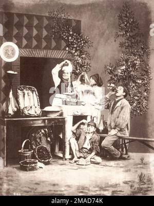 Giorgio Sommer - Spaghetti Eaters - c1870 - Italian family get together for spaghetti pasta dish. Stock Photo