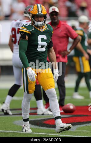 Green Bay Packers safety Dallin Leavitt (6) runs down the field