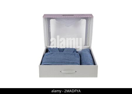 Folded Bath Towel Set and bath robe set. Bathrobe and slippers isolated on white. Stock Photo