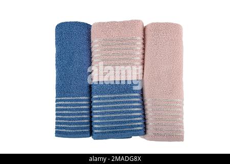 Folded Bath Towel Set and bath robe set. Bathrobe and slippers isolated on white. Stock Photo
