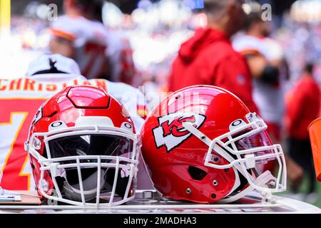 Kansas City Chiefs helmets sit on a cooler during the first half of an NFL  football game against the Indianapolis Colts, Sunday, Sept. 25, 2022, in  Indianapolis. (AP Photo/Michael Conroy Stock Photo 