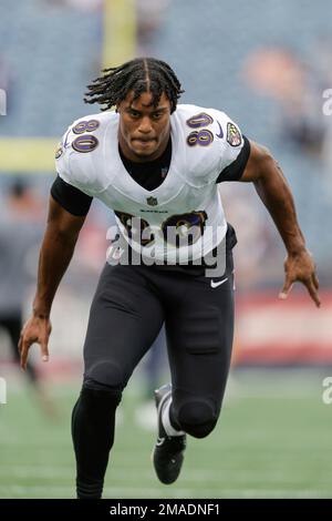 Baltimore Ravens tight end Isaiah Likely (80) warms up prior to an