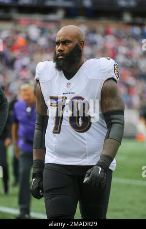 Morgan Moses of the Baltimore Ravens blocks against the Denver