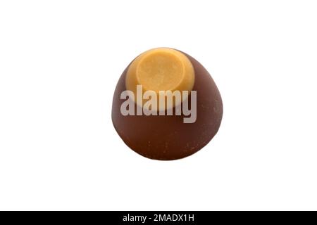 Salted Caramel chocolate from Waitrose Indulgent Chocolate Collection isolated on white background - gooey salted caramel in milk chocolate Stock Photo