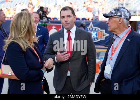 From left, Denver Broncos owners Rob Walton and his daughter, Carrie Walton  Penner, join Hannah McNair and her husband, Houston Texans chairman and  chief executive officer Cal McNair, before an NFL football