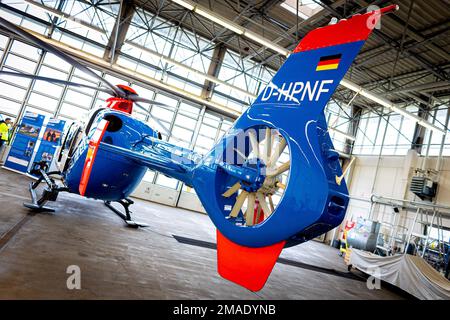 Langenhagen, Germany. 16th Jan, 2023. An Airbus EC-135 P2  police helicopter of the Lower Saxony Police Helicopter Squadron is parked on the grounds of Hannover-Langenhagen Airport. Credit: Moritz Frankenberg/dpa/Alamy Live News Stock Photo