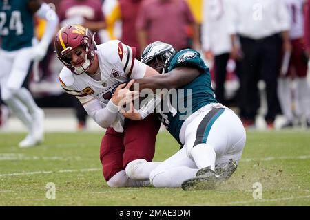 Philadelphia Eagles defensive tackle Javon Hargrave, left, celebrates his  sack of Houston Texans quarterback Davis Mills with Brandon Graham during  the first half of an NFL football game, Thursday, Nov. 3, 2022