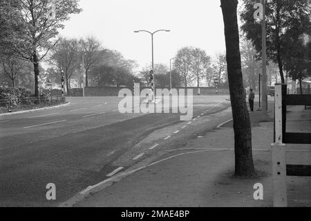 1950s historical new road junction with traffic lights onto