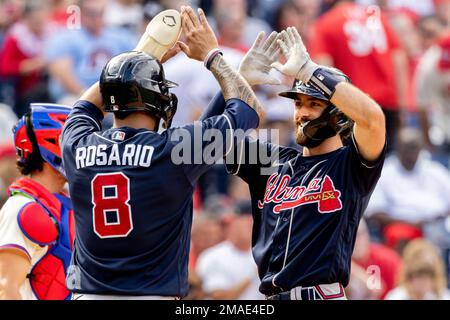 Atlanta, GA, USA. 04th July, 2019. Atlanta Braves shortstop Dansby Swanson  (left) kisses the head of infielder Ozzie Albies (right) after hitting an  eighth inning home run during a MLB game against