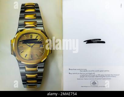 Patek Philippe Geneve nautilus with gold dial advert in a in a NatGeo magazine, August 1995 Stock Photo