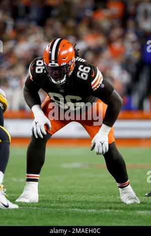 Cleveland Browns offensive tackle James Hudson III (66) lines up for a play  during an NFL football game against the Baltimore Ravens, Sunday, Dec. 12,  2021, in Cleveland. (AP Photo/Kirk Irwin Stock