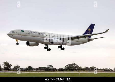 Saudia - Saudi Arabian Airlines Airbus A330-343 (REG: HZ-AQ25) arriving in light rain for servicing in Malta. Stock Photo