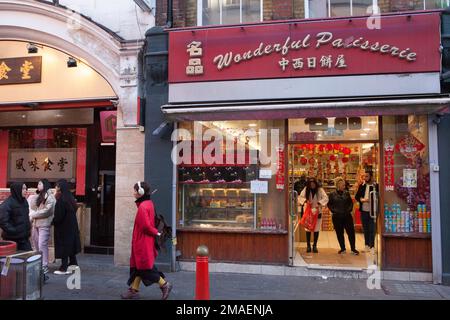 London, UK, 19 January 2023: In advance of Chinese New Year and the streets of Chinatown are packed with locals and tourists. The Chinese Year of the Rabbit begins on Sunday 22nd January and bakeries are doing brisk business in Chinese style cakes. Anna Watson/Alamy Live News Stock Photo