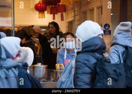 London, UK, 19 January 2023: In advance of Chinese New Year and the streets of Chinatown are packed with locals and tourists. The Chinese Year of the Rabbit begins on Sunday 22nd January and bakeries are doing brisk business in Chinese style cakes. Anna Watson/Alamy Live News Stock Photo