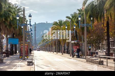 Barcelona, Spain - December 15, 2018: Christopher Columbus Statue in Barcelona, Spain. Passeig del Colom. Columbus Avenue with Palms. - Stock Photo