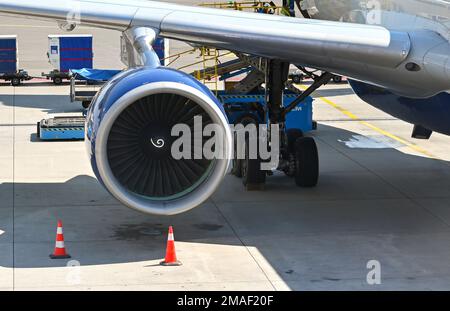 Amsterdam, Netherlands - August 2022: Close up view of the engine of a wide bodied passenger jet at the city's Schipol Airport. Stock Photo