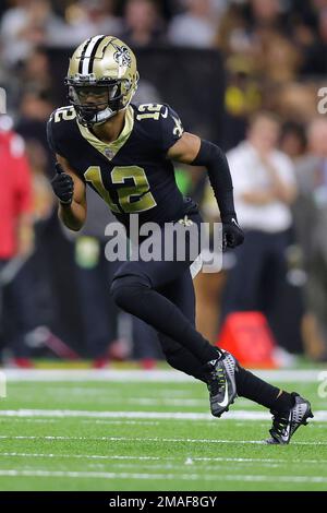 New Orleans Saints wide receiver Chris Olave (12) runs a route during an NFL  football game against the Tampa Bay Buccaneers, Sunday, Sept. 18, 2022, in  New Orleans. (AP Photo/Jonathan Bachman Stock