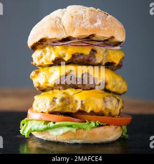 Authentic top quality American triple cheese Burger Stock Photo