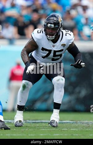 Jacksonville Jaguars offensive tackle Jawaan Taylor (75) runs onto