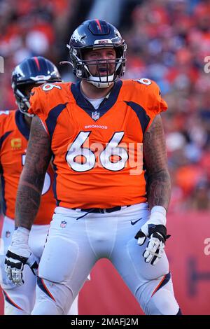 Denver, CO, USA. 28th Nov, 2021. Denver Broncos guard Dalton Risner (66)  signals first down after a strong run by Denver Broncos running back  Javonte Williams (33) in the first half of