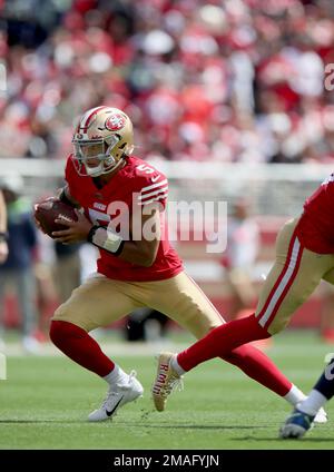 Santa Clara, United States. 18th Sep, 2022. SANTA CLARA, CALIFORNIA - SEPTEMBER  18: San Francisco 49ers starting quarterback Trey Lance (5) scrambles  against the Seattle Seahawks in the first quarter at Levi's