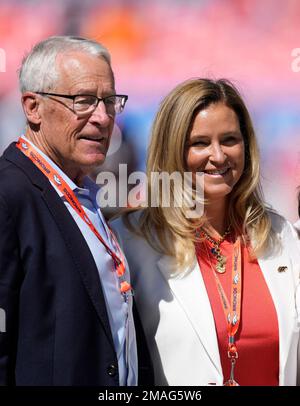 San Francisco 49ers chief executive officer Jed York, middle, talks with Denver  Broncos owners Carrie Walton Penner, left, and Rob Walton before an NFL  football game in Denver, Sunday, Sept. 25, 2022. (