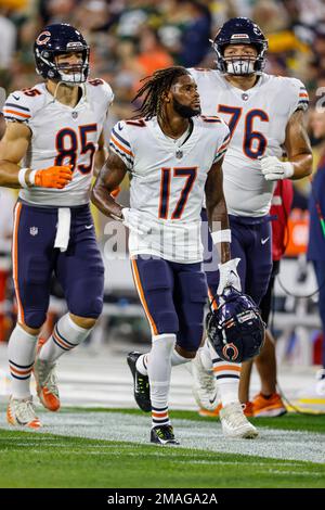 Chicago Bears guard Dieter Eiselen (60) and safety DeAndre Houston-Carson  (36) celebrate the Bears win against the San Francisco 49ers in an NFL  football game, Sunday, Sept. 11, 2022, in Chicago. (AP