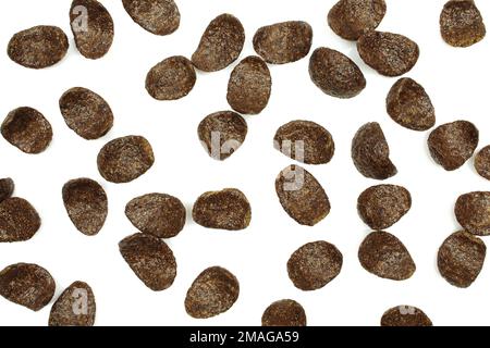 Chocolate cereals isolated on white background. Texture pattern Stock Photo