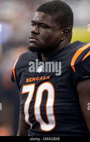 Cincinnati Bengals guard D'Ante Smith (70) looks to make a block