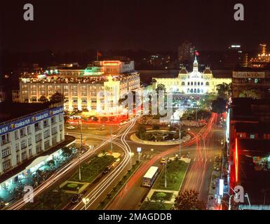 Rex Hotel , City Hall and Nguyen Hue Boulevard at night, Ho Chi Minh City (Saigon), Socialist Republic of Vietnam Stock Photo