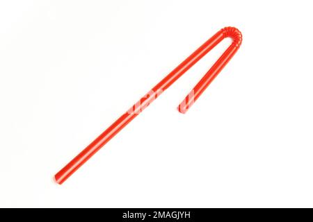 Red plastic straw isolated on white background Stock Photo